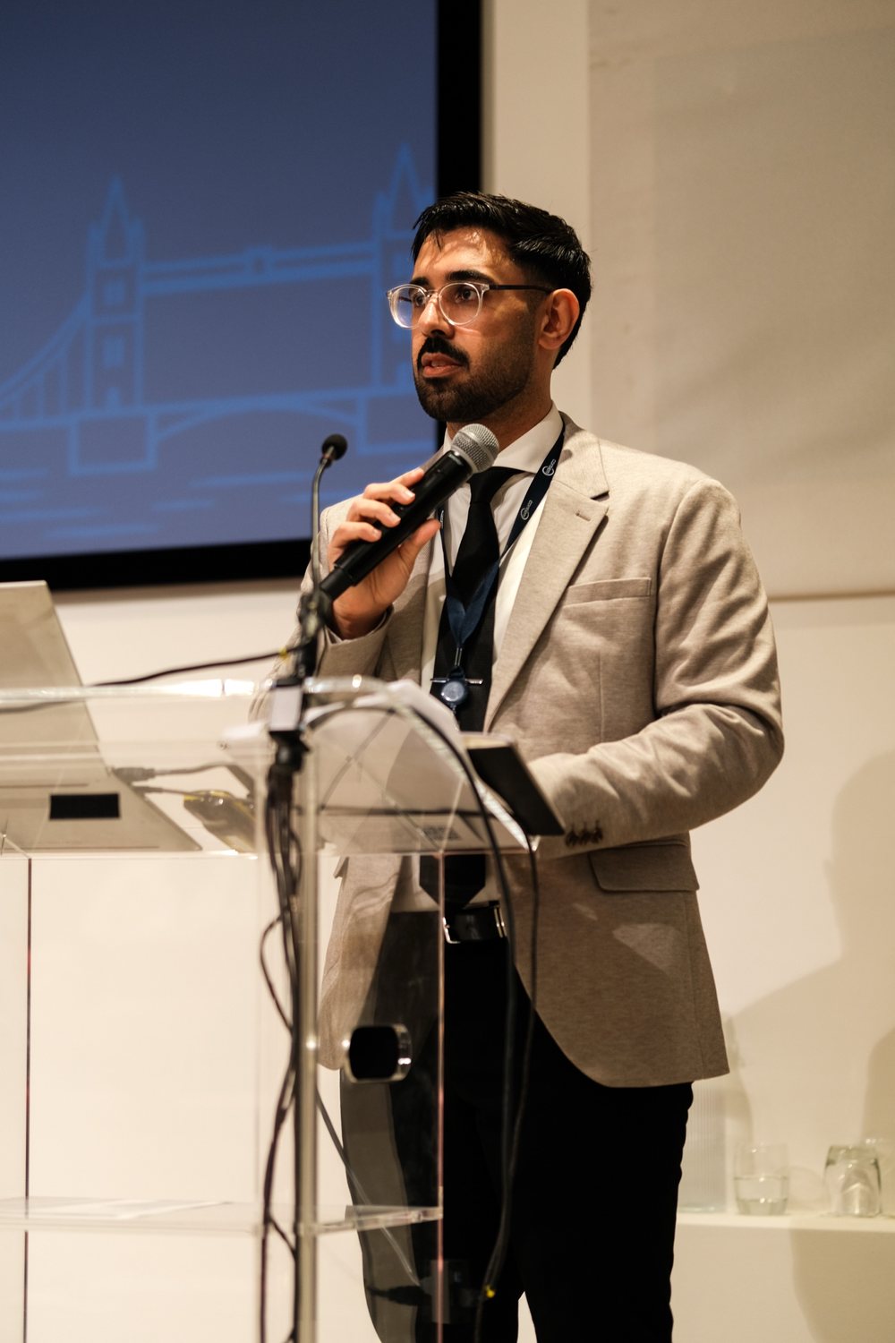 Haidar Hamid, H² co-founder, presenting at an industry event in London